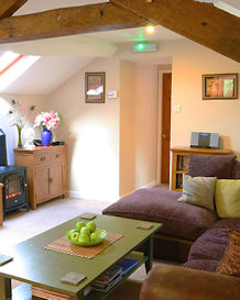 Beamed sitting room with cosy fire & TV/DVD for those cosy nights in!